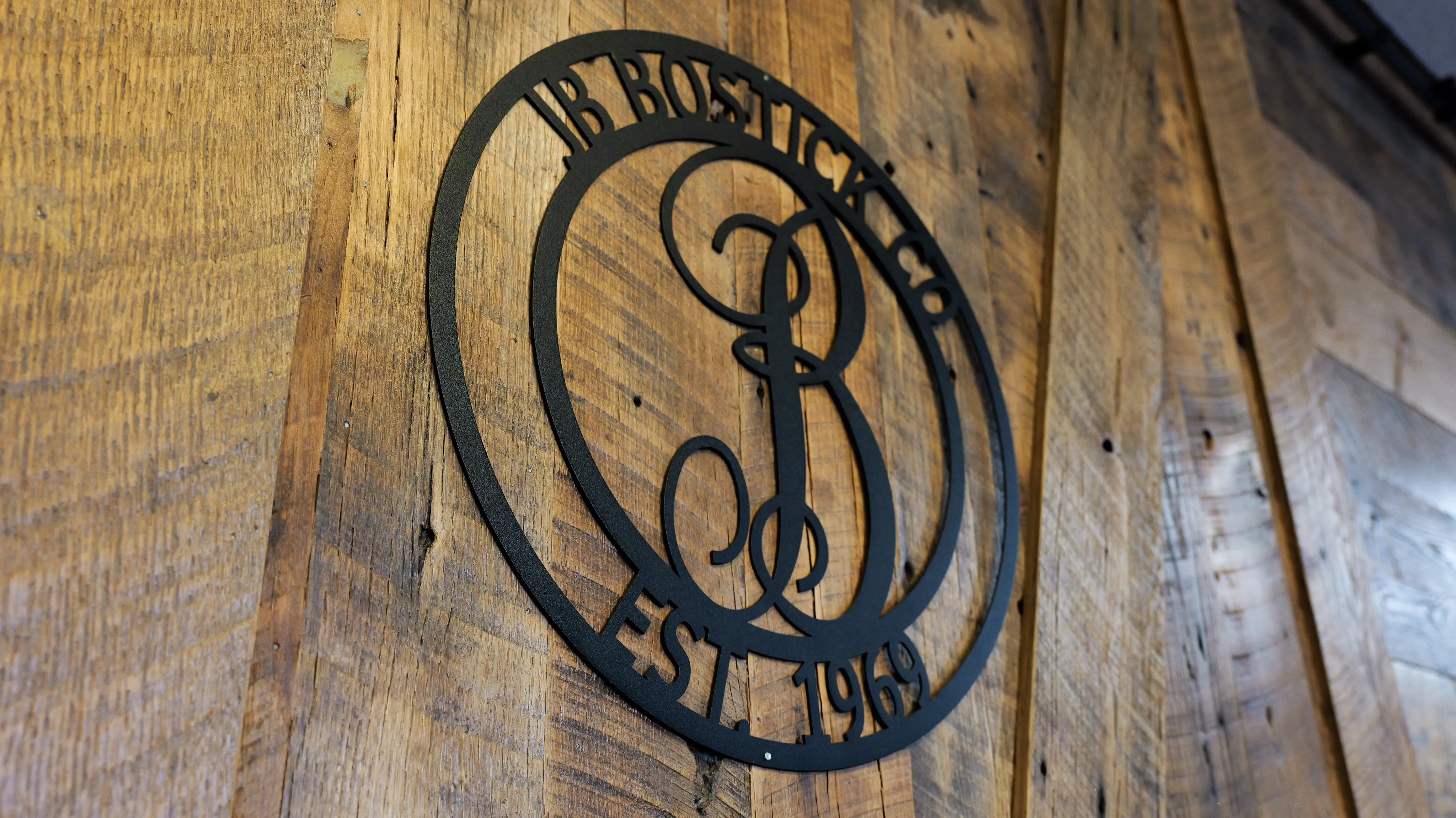 Wrought iron JB Bostick logo decor