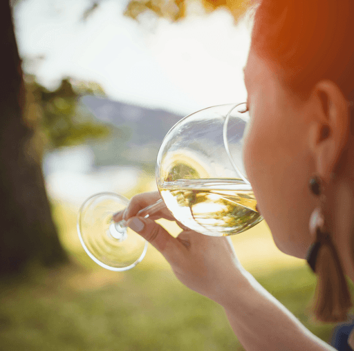 boy in white crew neck shirt holding clear glass bubble maker