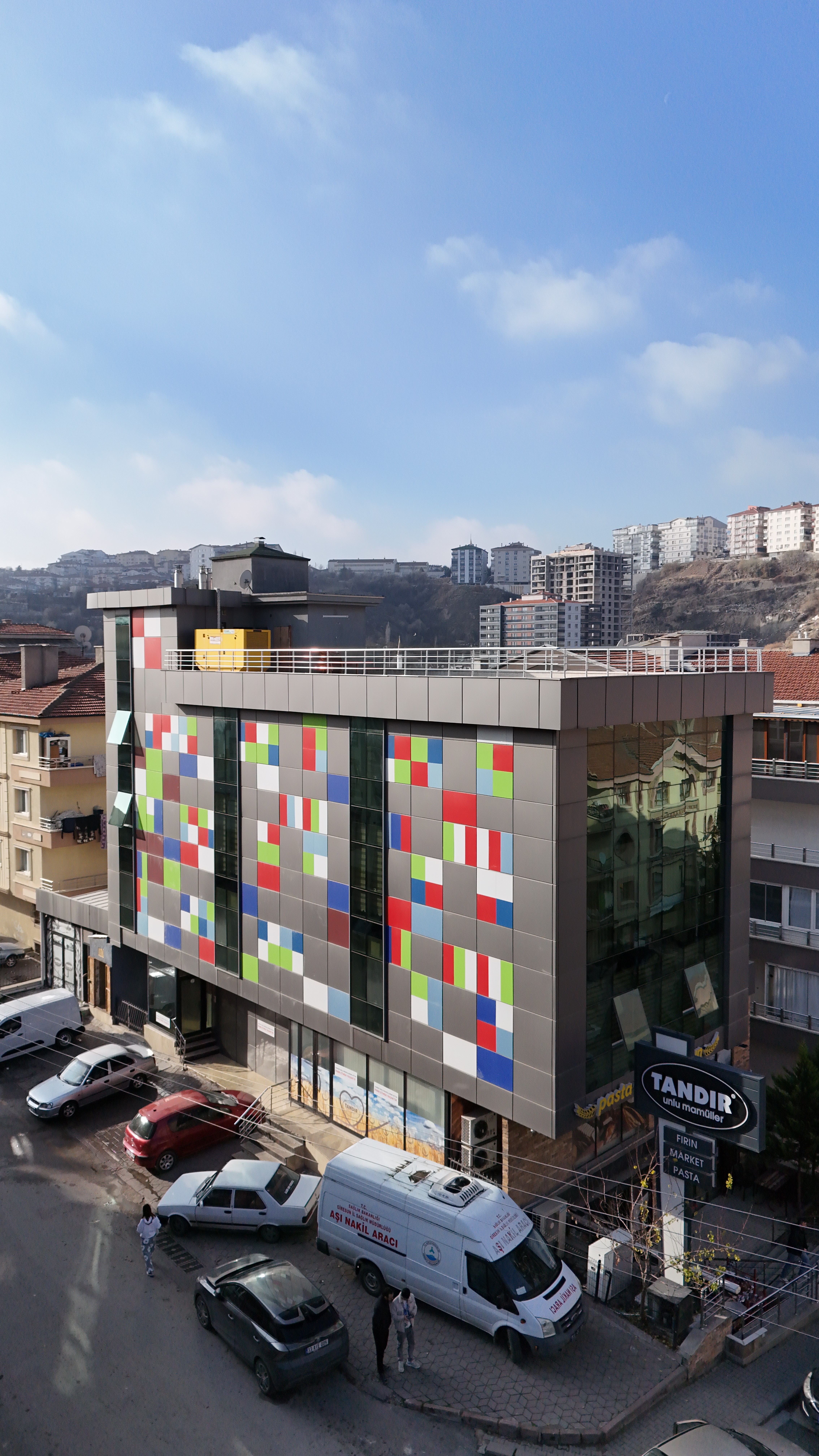 wide aerial view of a coastal mediterranean modern villa