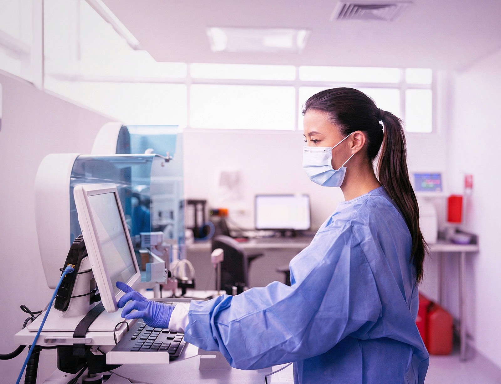 Modern office interior with glass walls, wooden accents, and a person walking up a staircase in motion blur.
