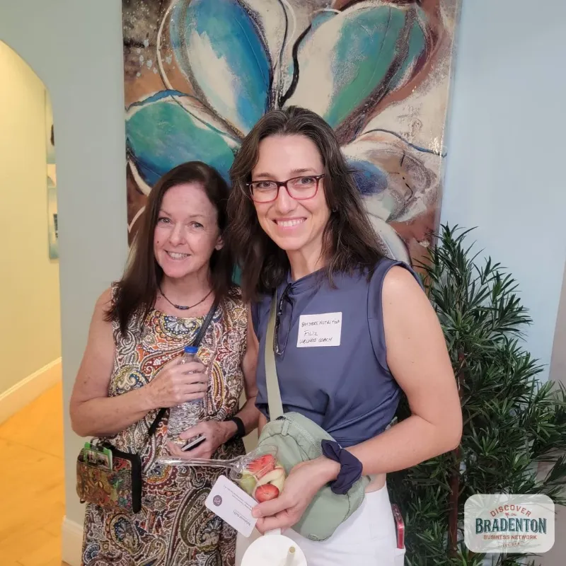 2 women standing next to each other bradenton