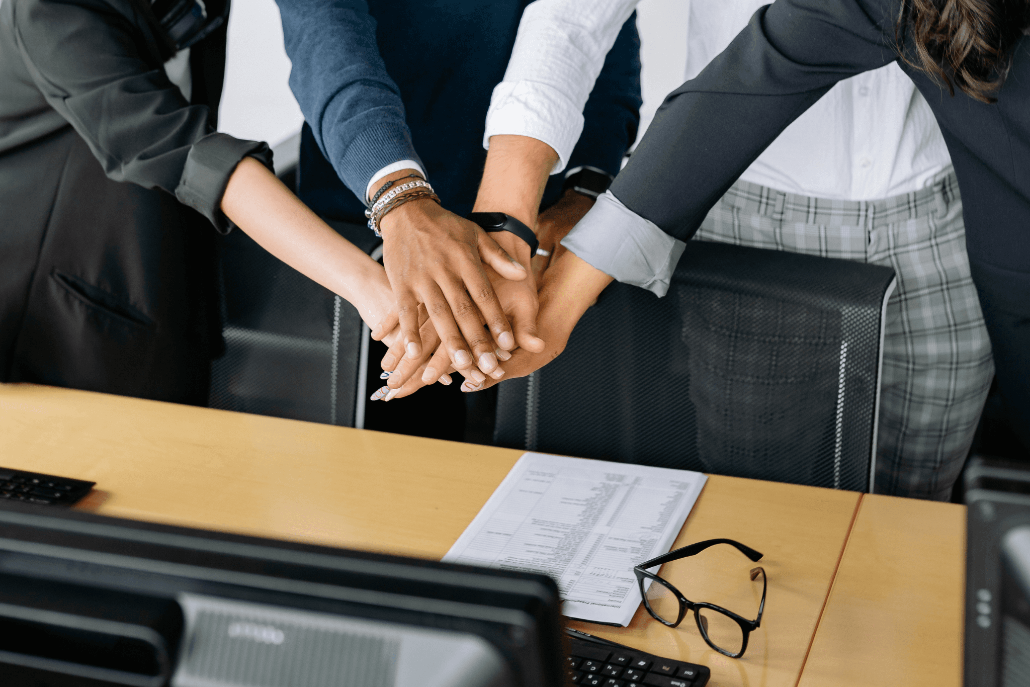 Group of men standing with Sufboard