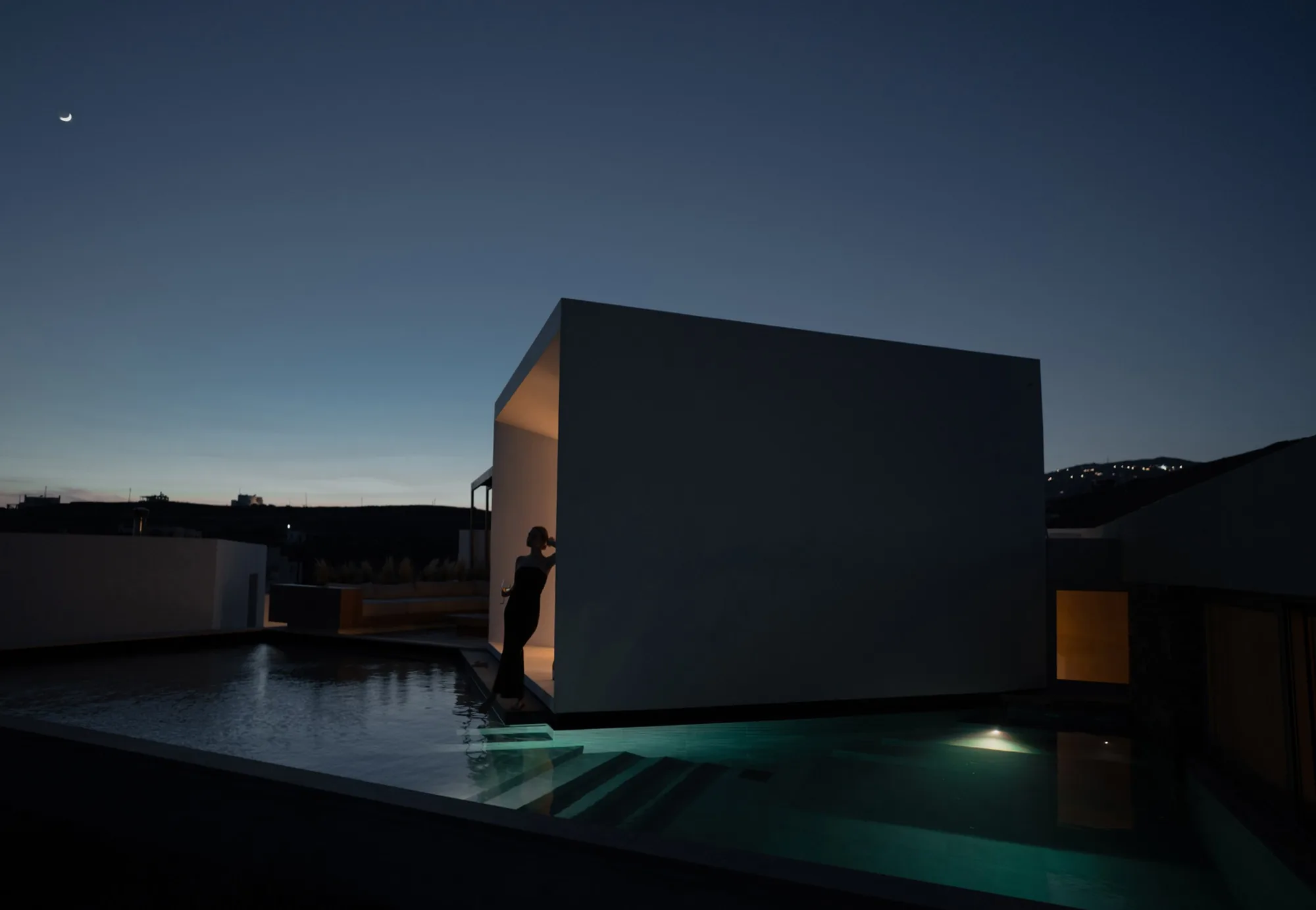 PNOES residence and pool at dusk on Tinos, Greece, photographed by TERAMOK