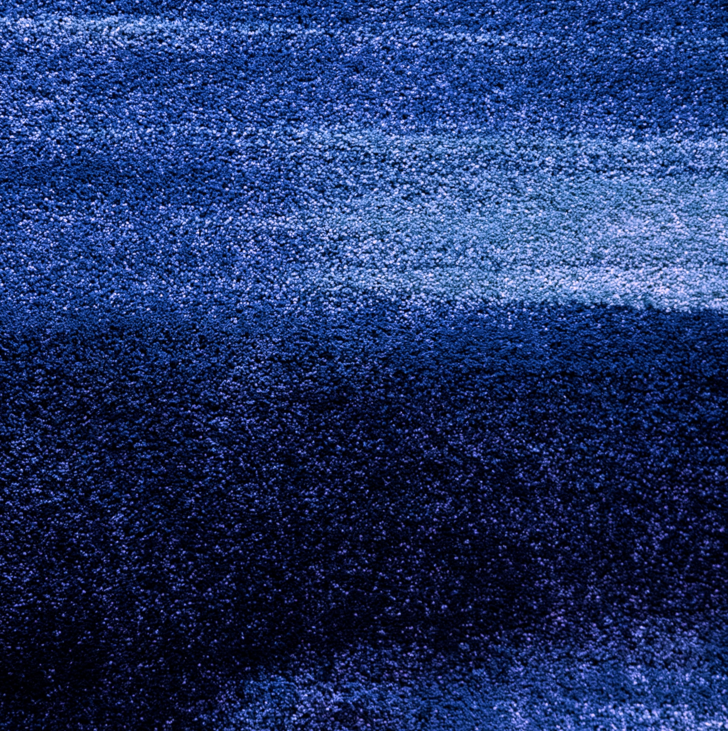 Music producer sitting on a chair in his studio