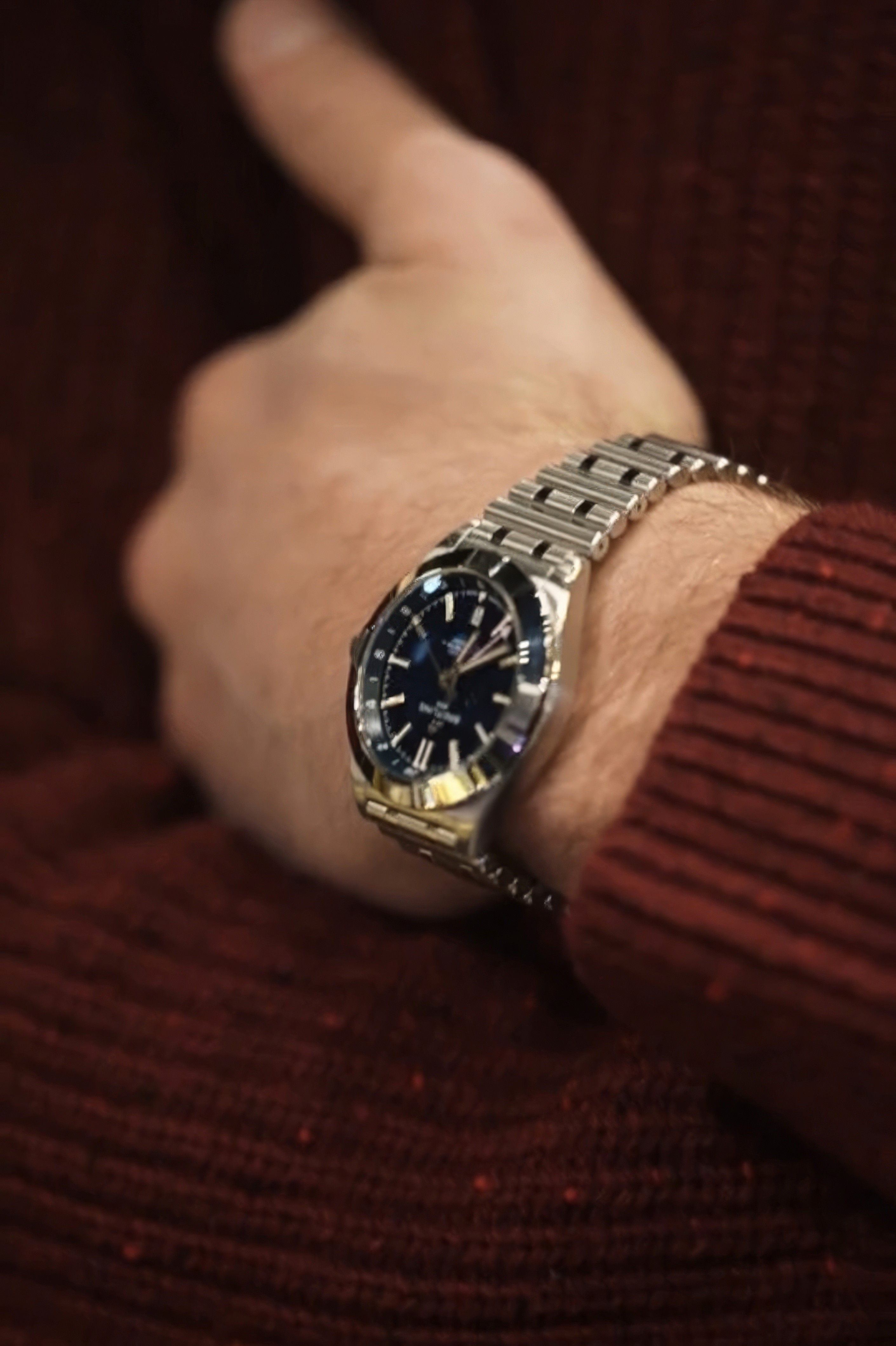Bride in white dress walking on street, man in background