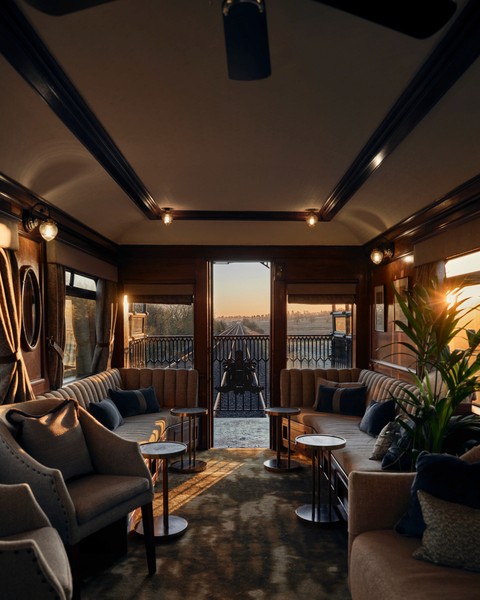 an aerial view of a baseball stadium with a city in the background