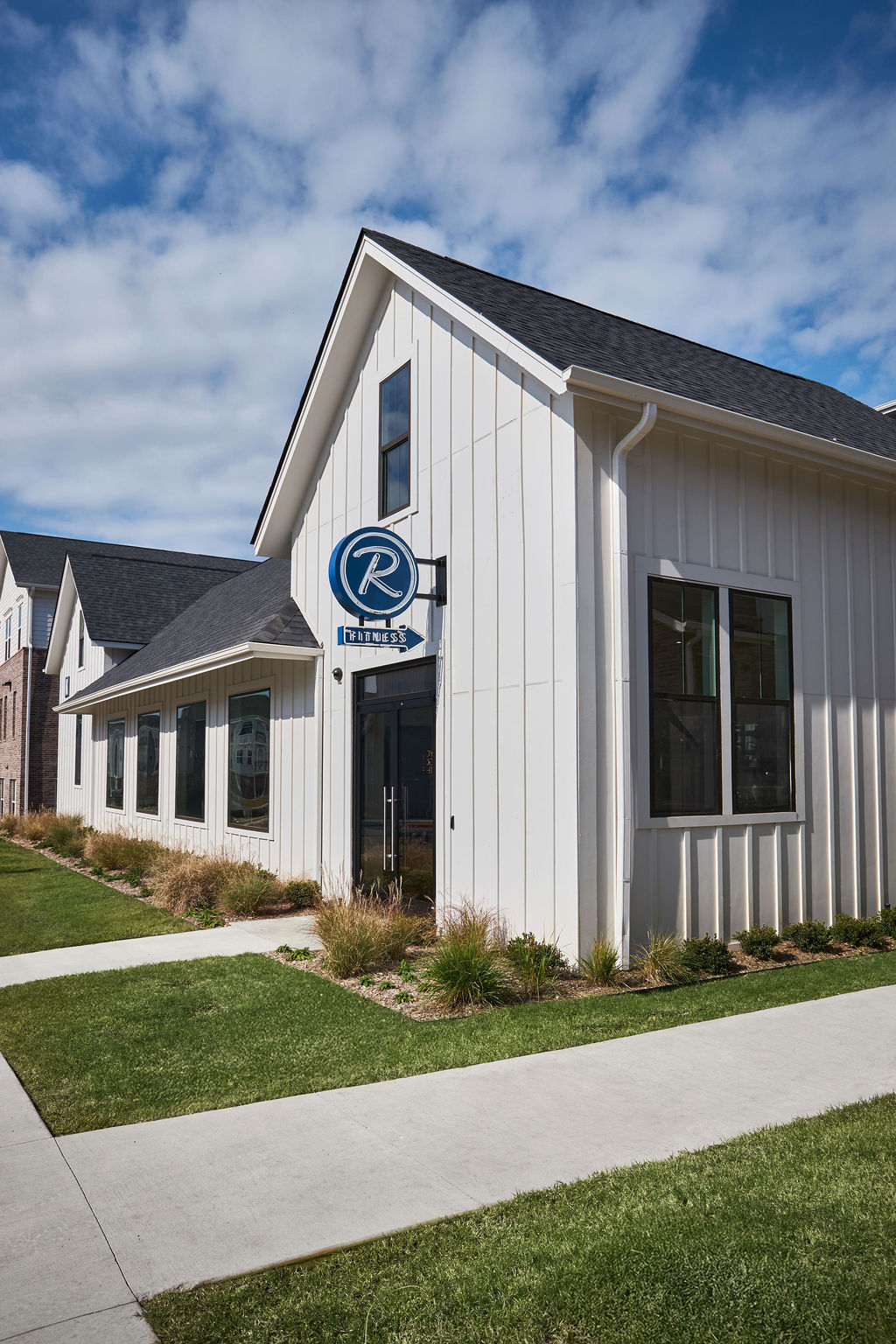 In Law/Guest Room with view of sink, bed, table and entry to bathroom from doorway of room