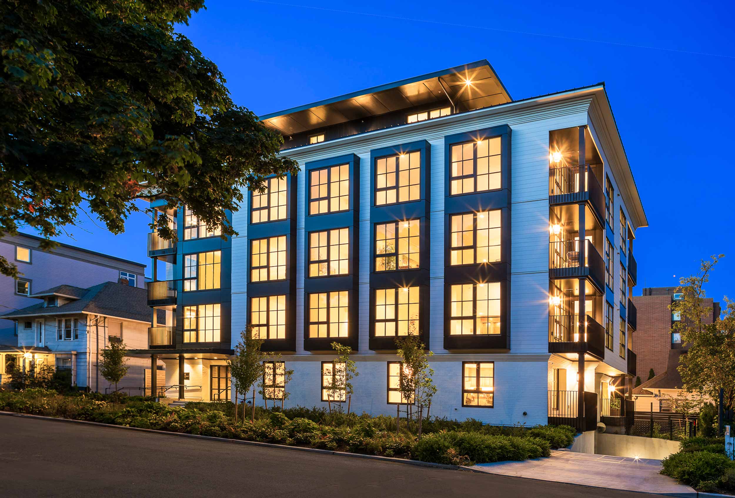 Evening street view image of Fitzgerald Condominiums in Seattle, Washington