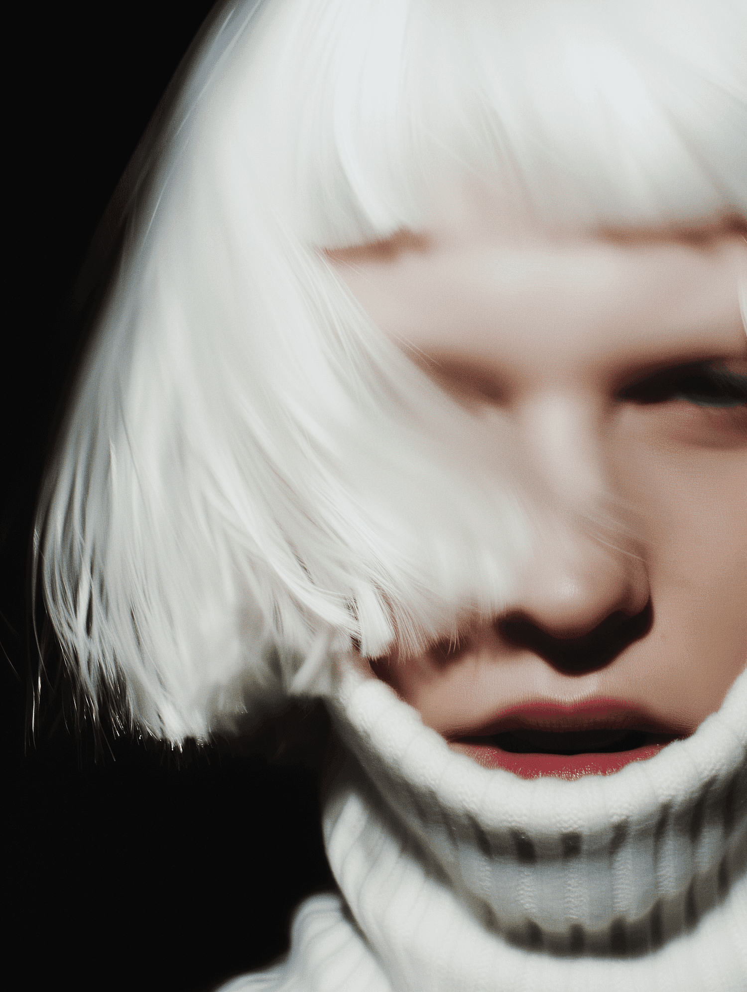 Close portrait of a woman with platinum hair covering her face