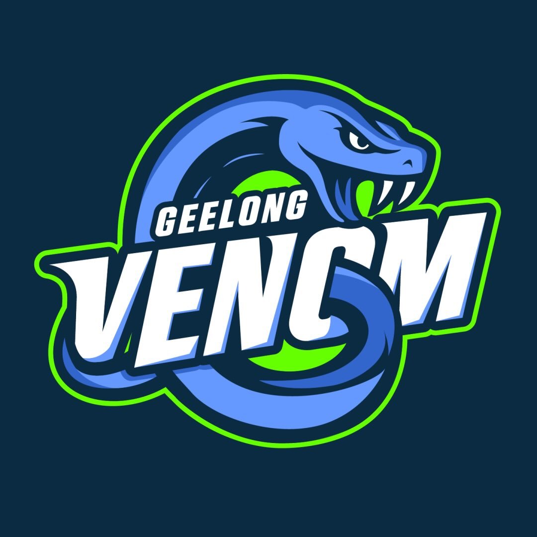 A woman with blonde bob hair in a grey coat and beige turtleneck stands against a neutral backdrop. She has a serious expression, conveying elegance.