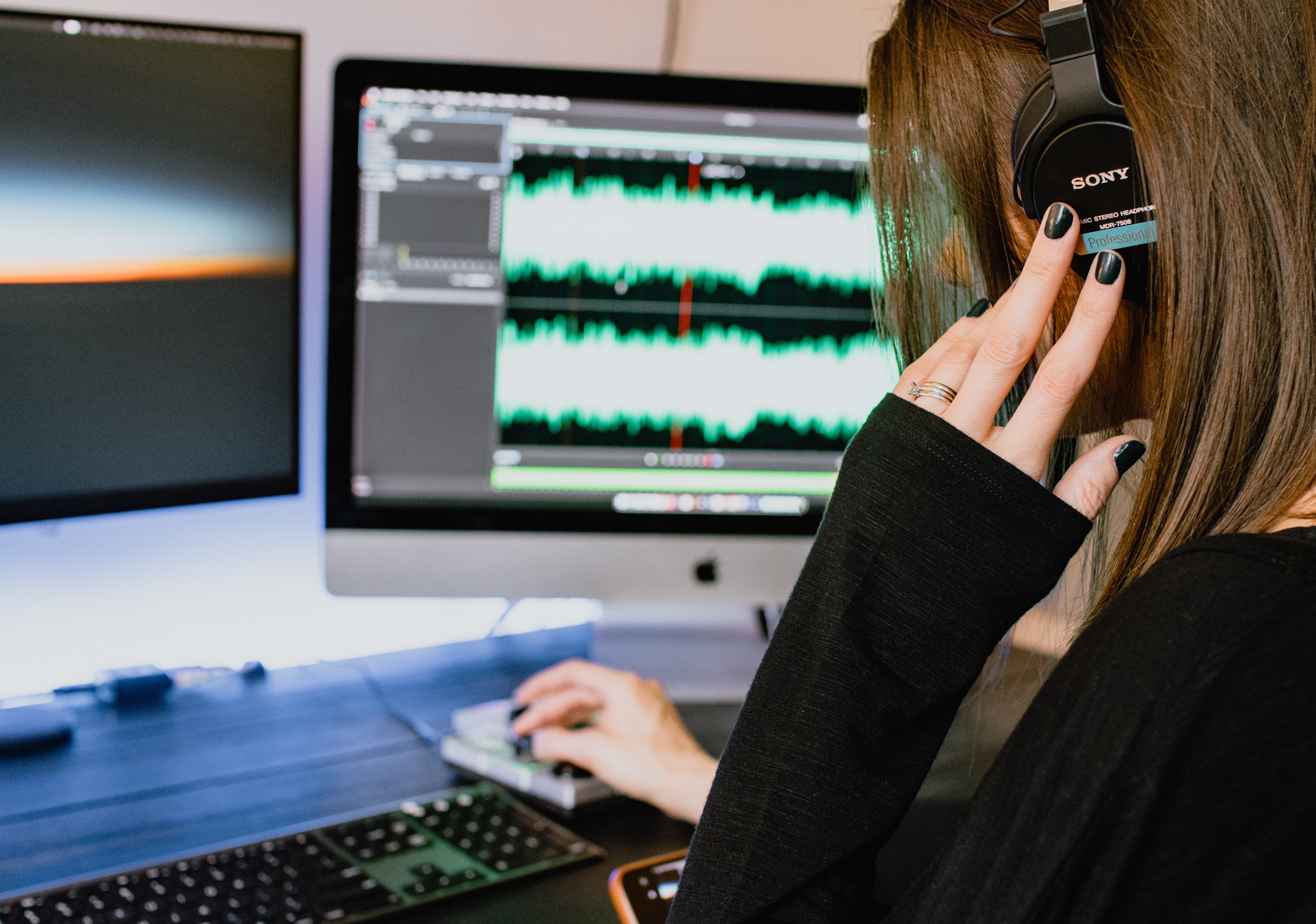 WOman listening to the pitch of her voice - female voice type