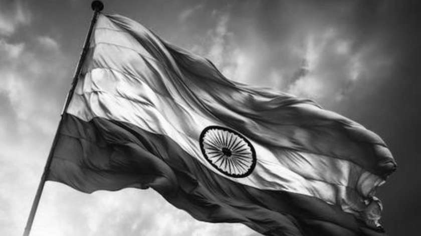 kids lying on a glass land and smiling