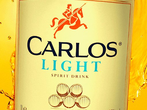 Rooftops of a coastal town with the sea in background