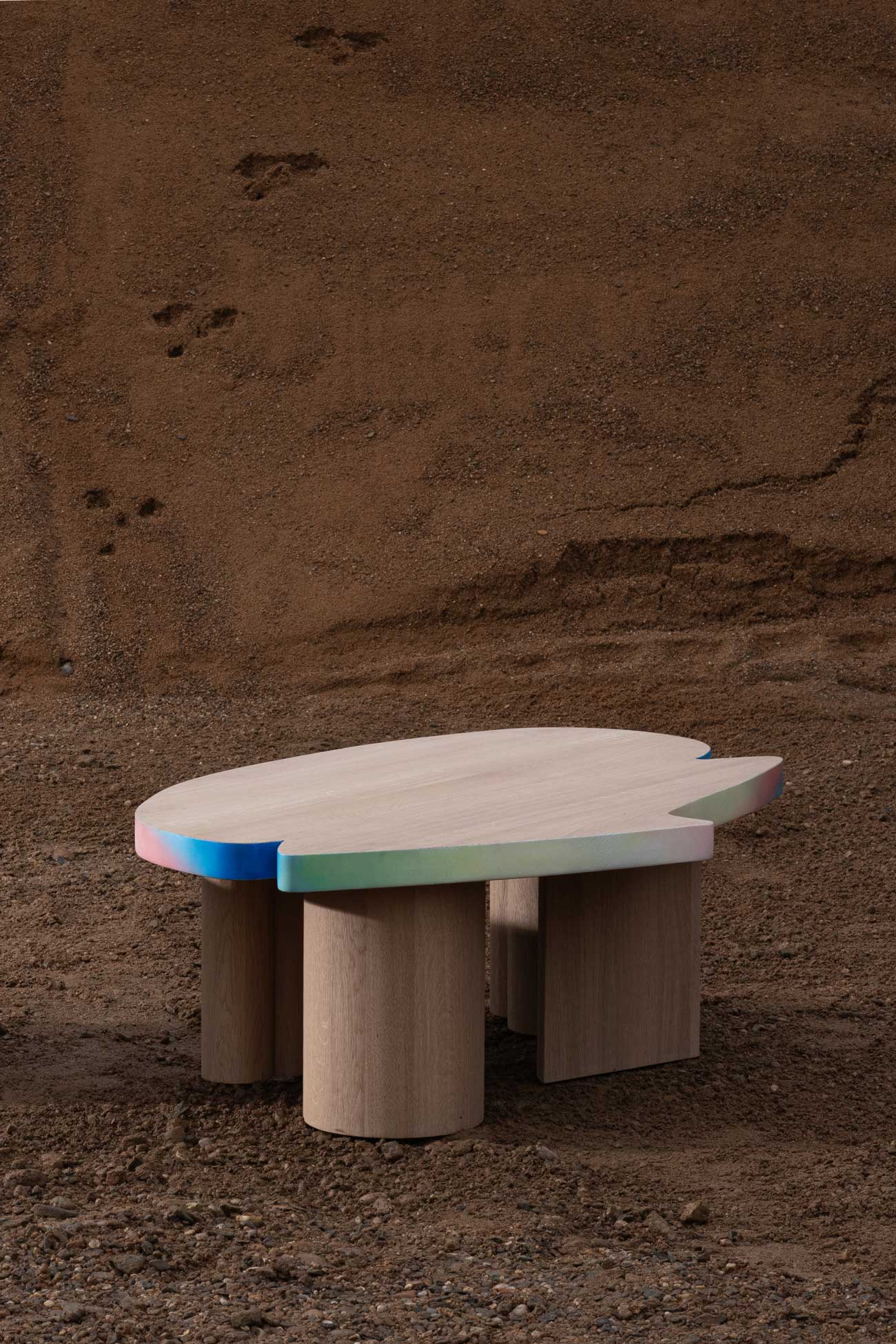 Cloudy impromptu pastorale low wood table with bold geometric top and legs and gradient by Jiri Krejcirik