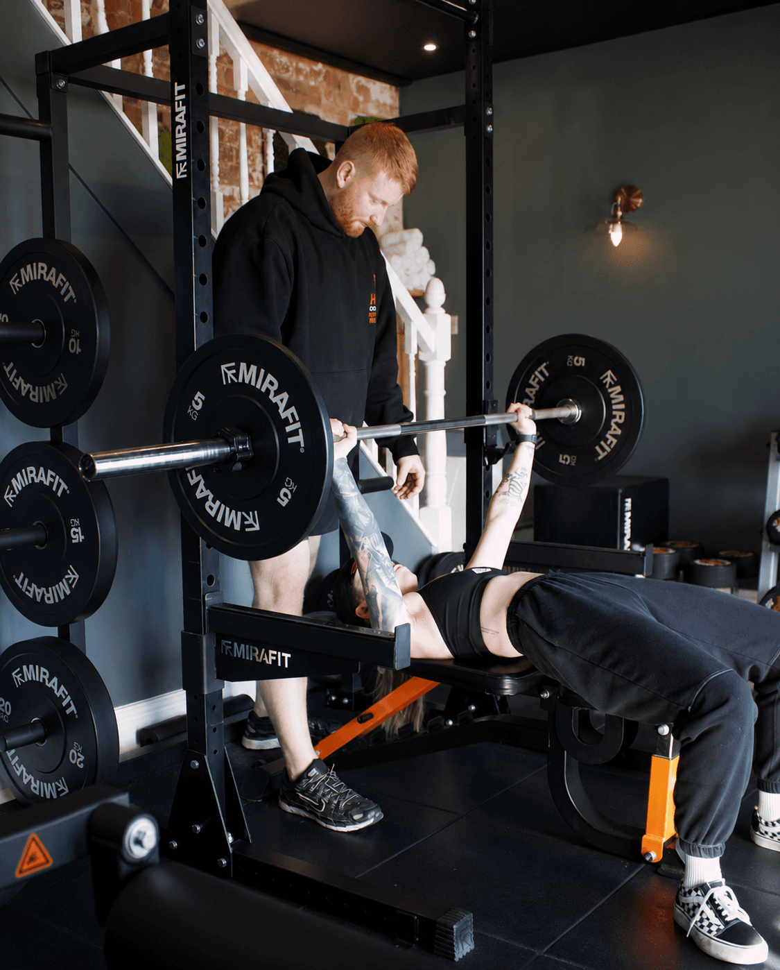 a man and woman exercising