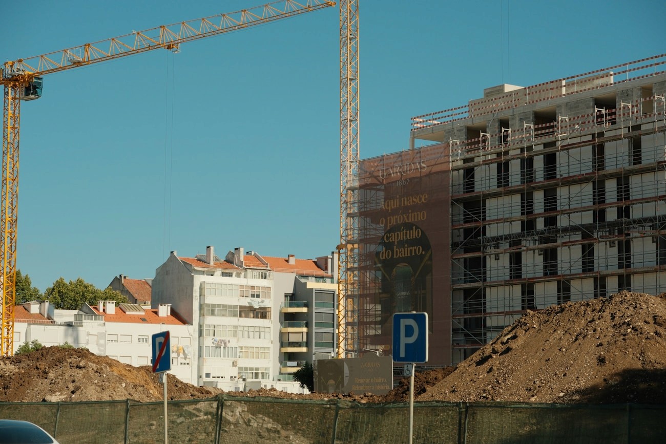 Construction site with scaffolding and crane