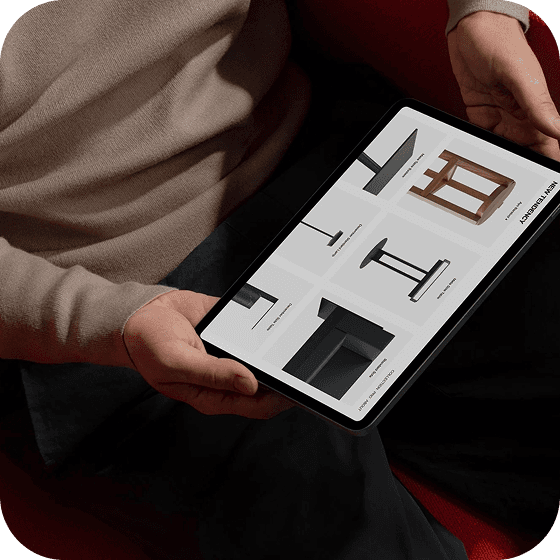 A person holding a tablet