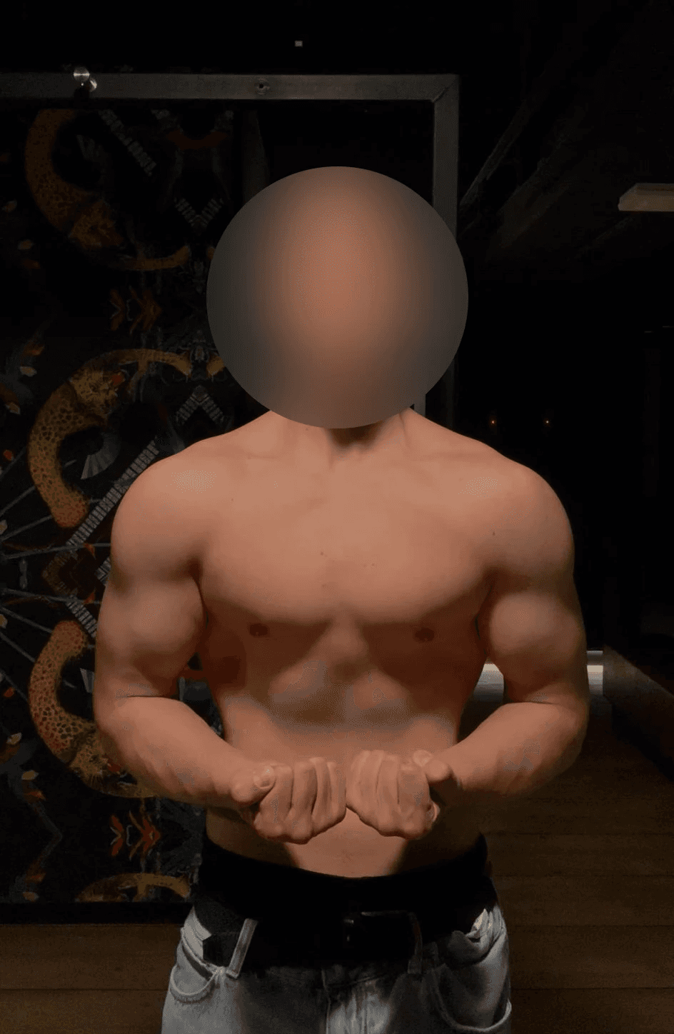 greyscale photo of woman in bralette inside room