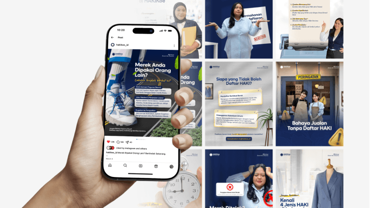 A hand holds a smartphone displaying a business app, surrounded by various digital marketing materials and graphics.