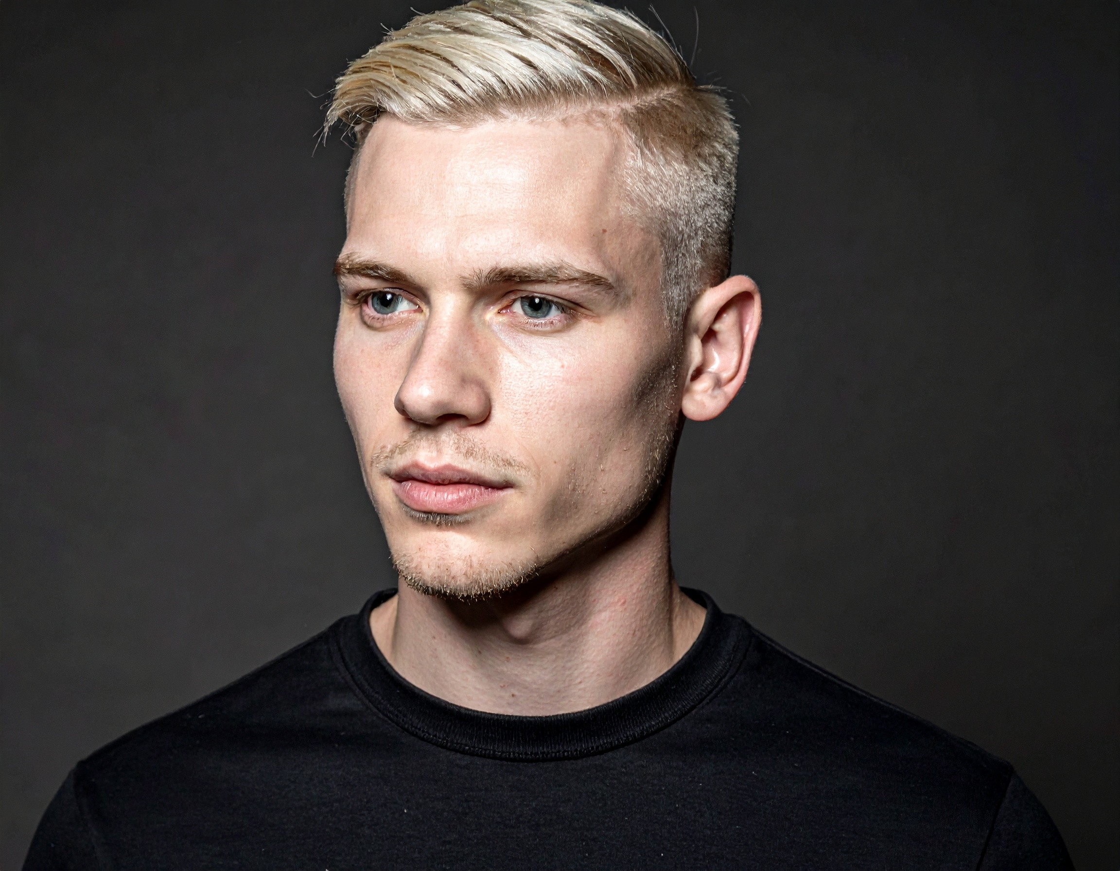 man with short parted to the side hair