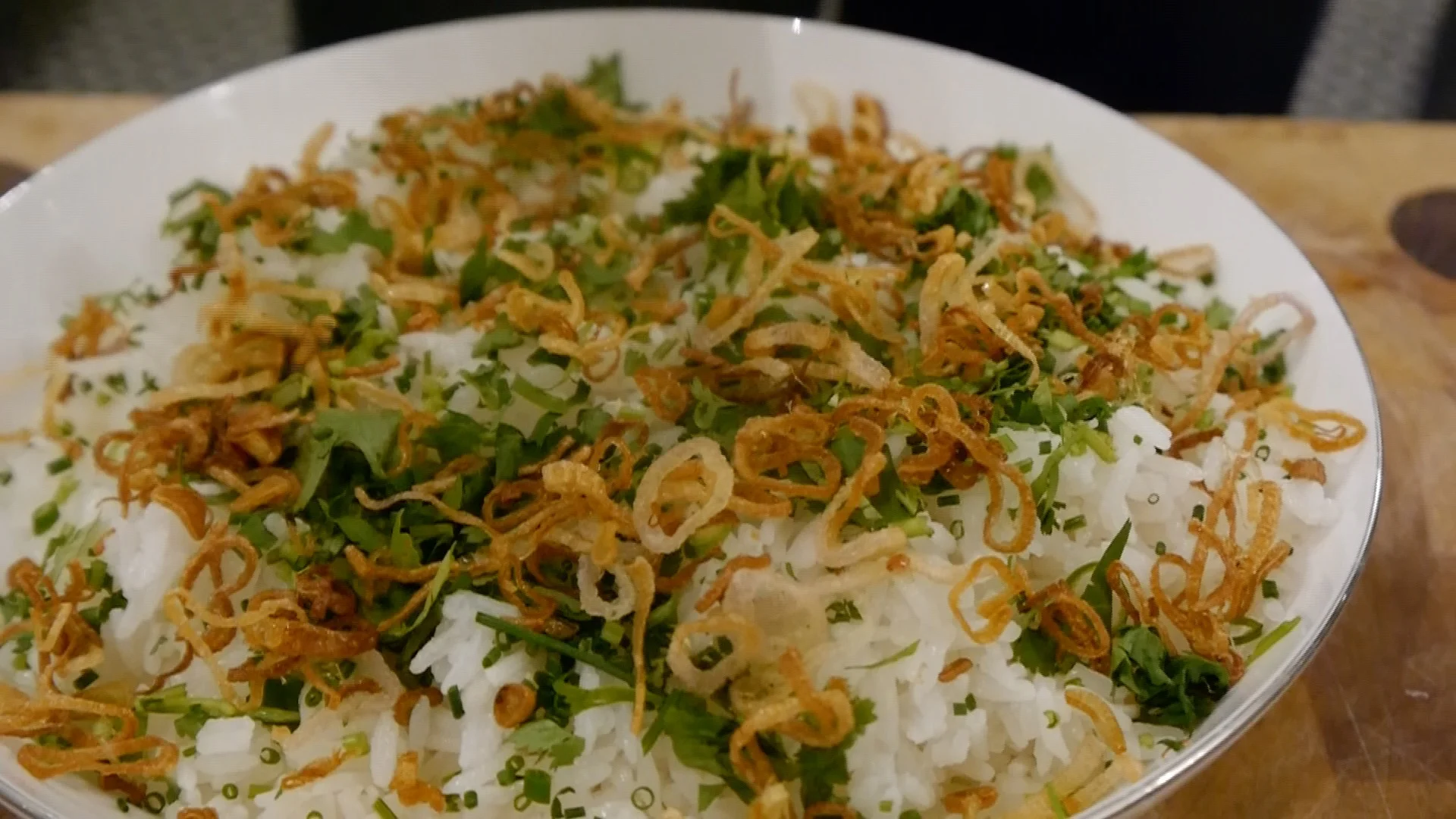 Coconut rice with topping in a bowl