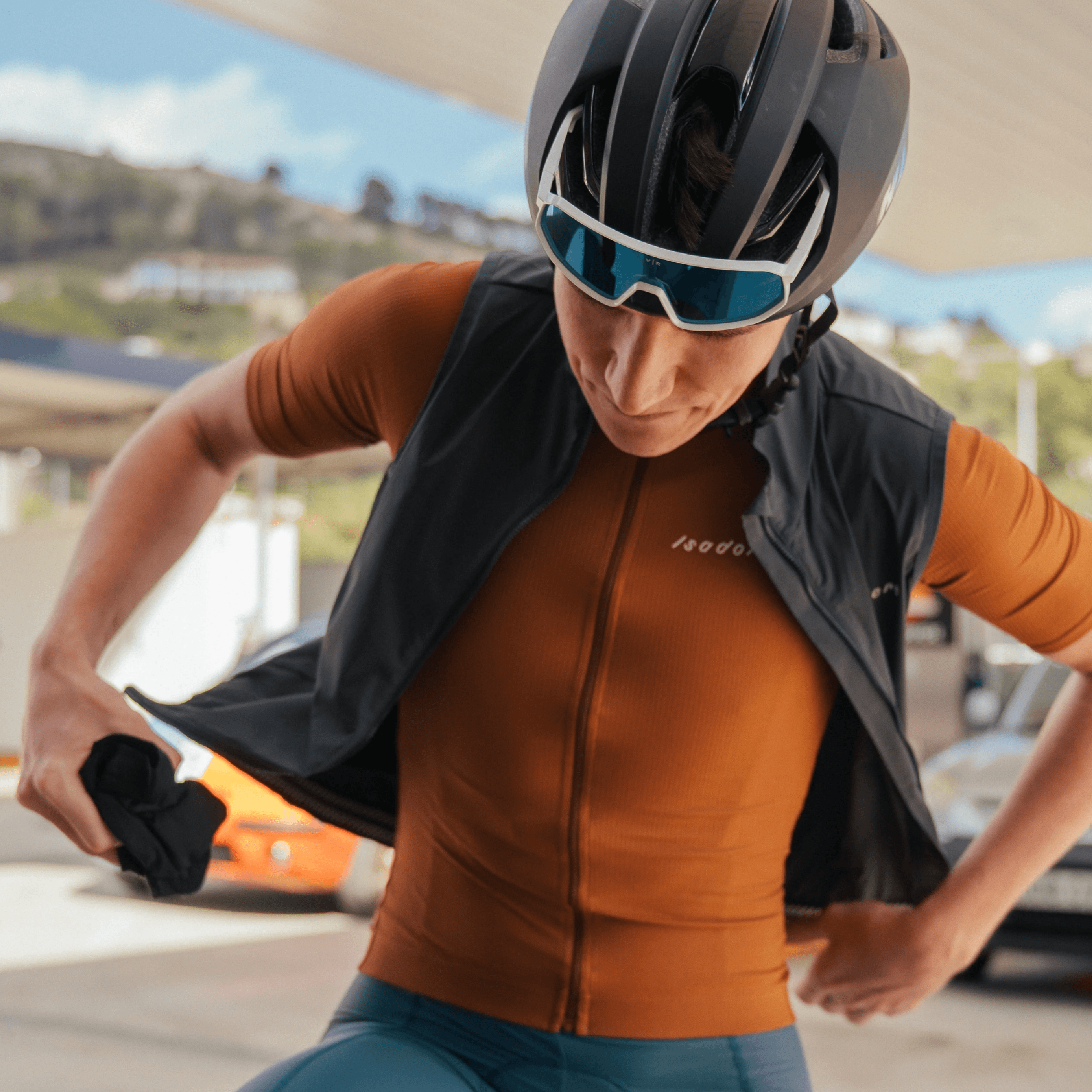 clsoe look on a man preparing for a ride.