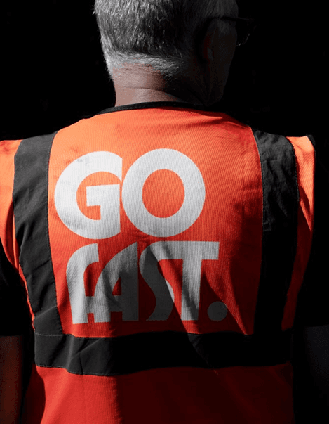 Professional woman in blazer standing confidently