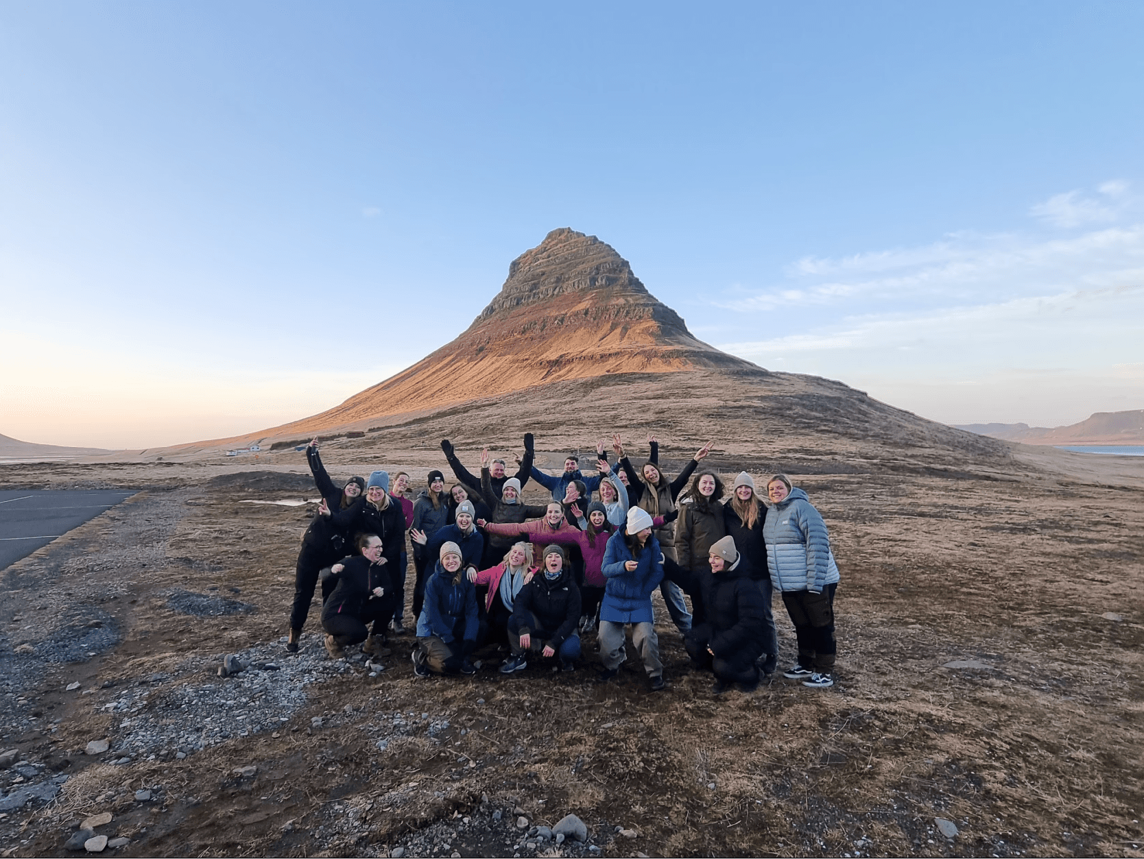 A group of people looking into the camera