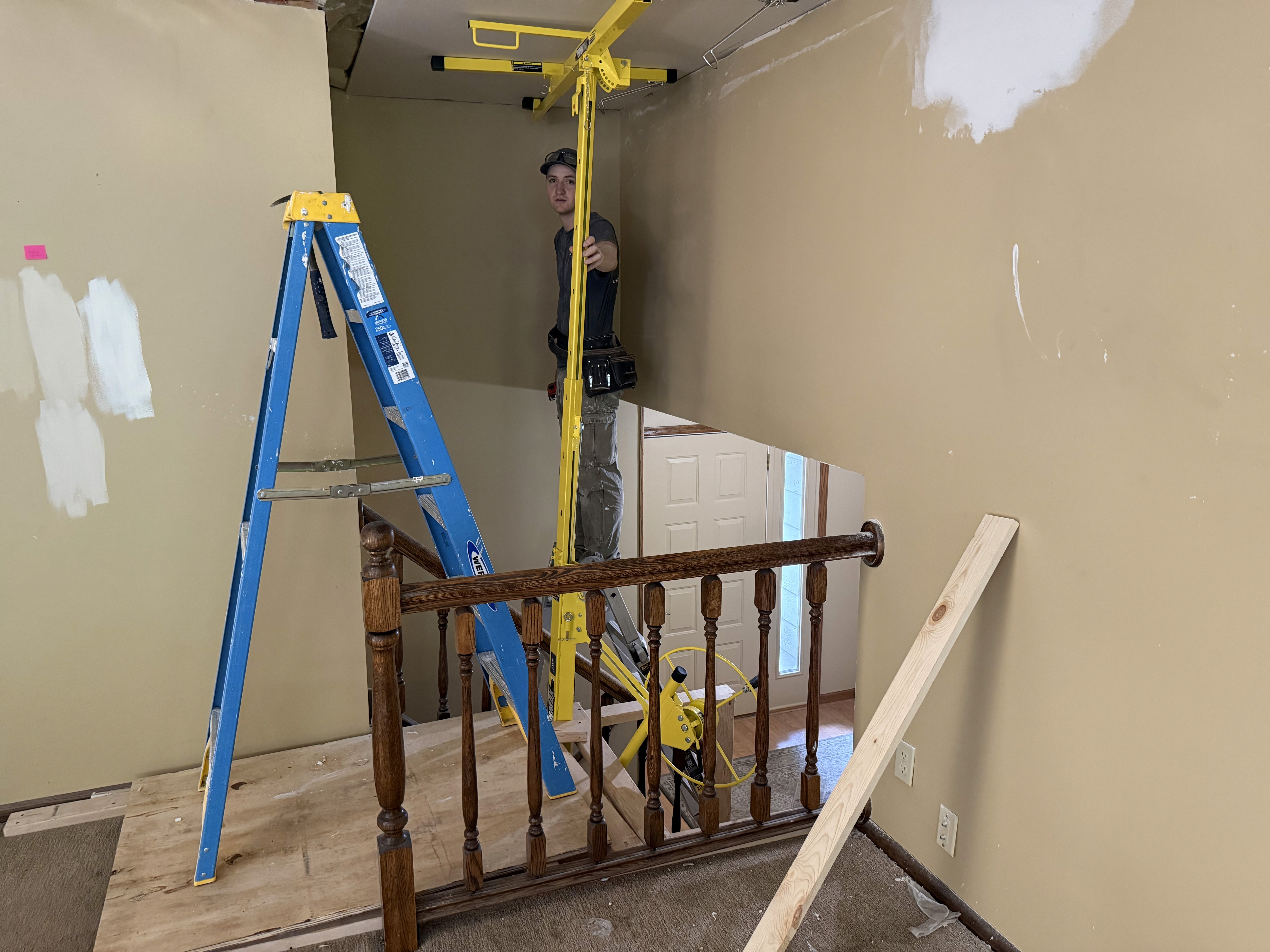 Tate Hange Drywall on ceiling