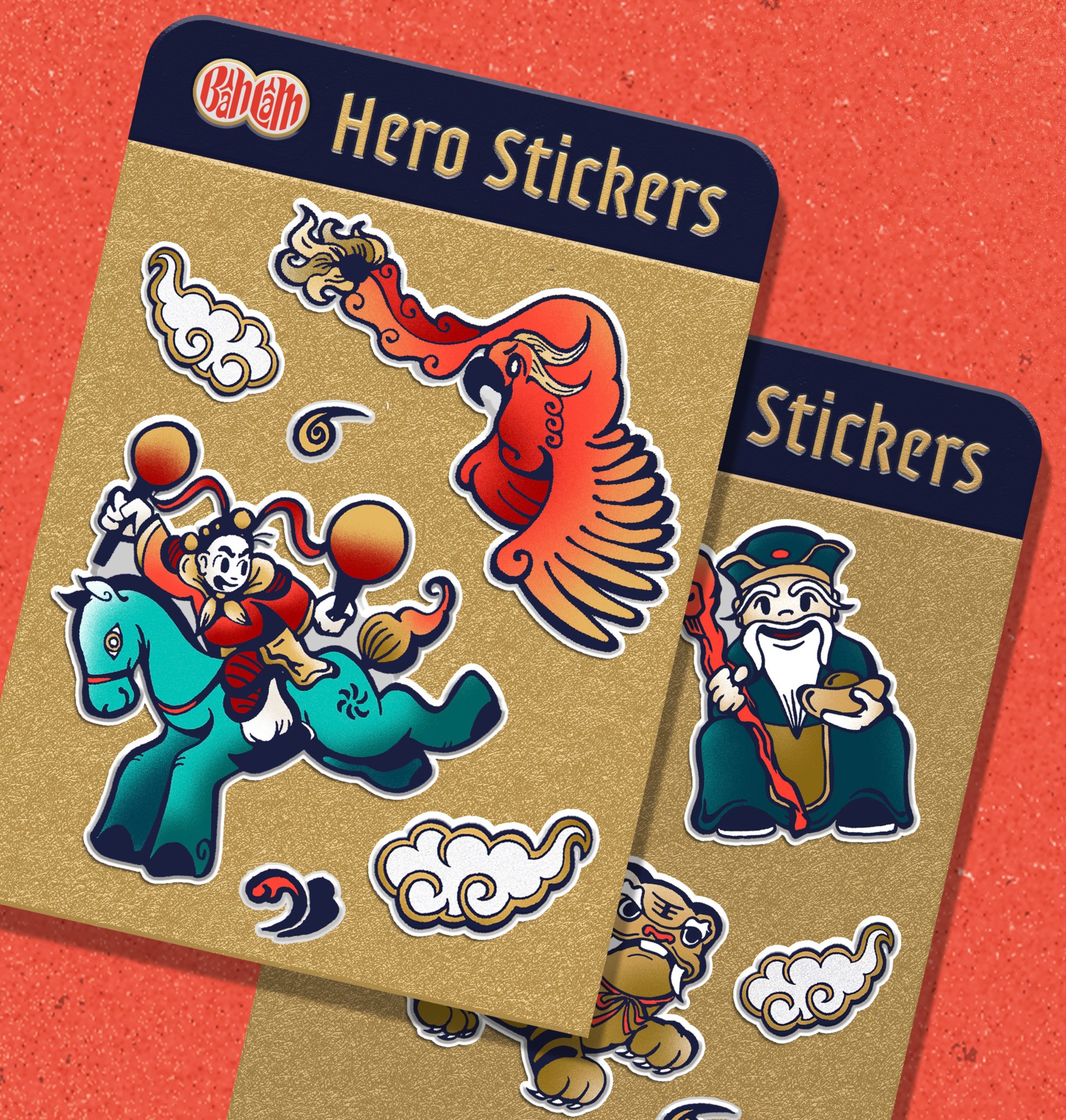 Two gold stickers with dark blue borders display cartoon characters. The top sticker features a red bird-like creature with wings and a flowing tail, positioned above a teal horse-like creature with a rider. The bottom sticker depicts a white-bearded figure in a green robe holding a staff, positioned to the right of a smaller, brown-furred creature. The stickers have the text "Hero Stickers" at the top and "Stickers" along the right edge. The background is a textured red surface.
