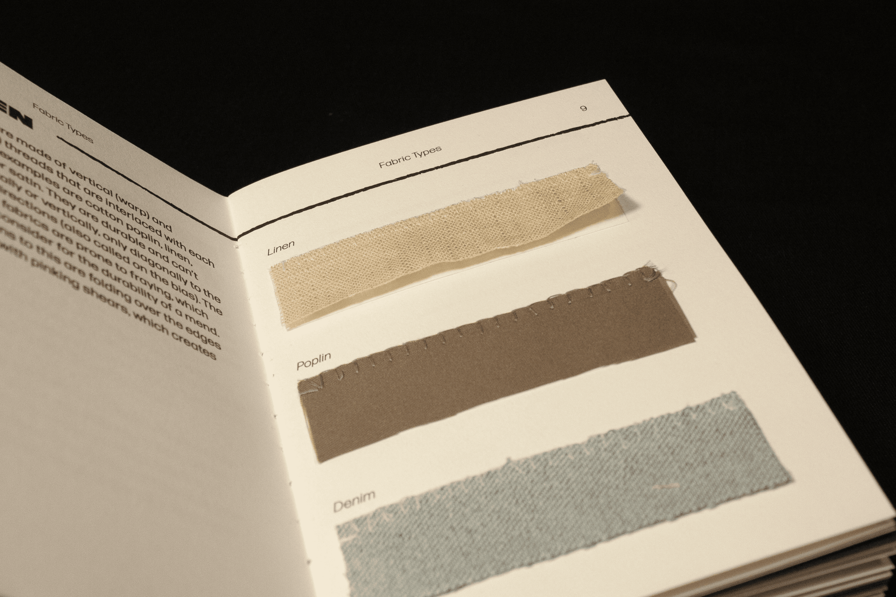 Fabric samples attached to pages of the mending guide