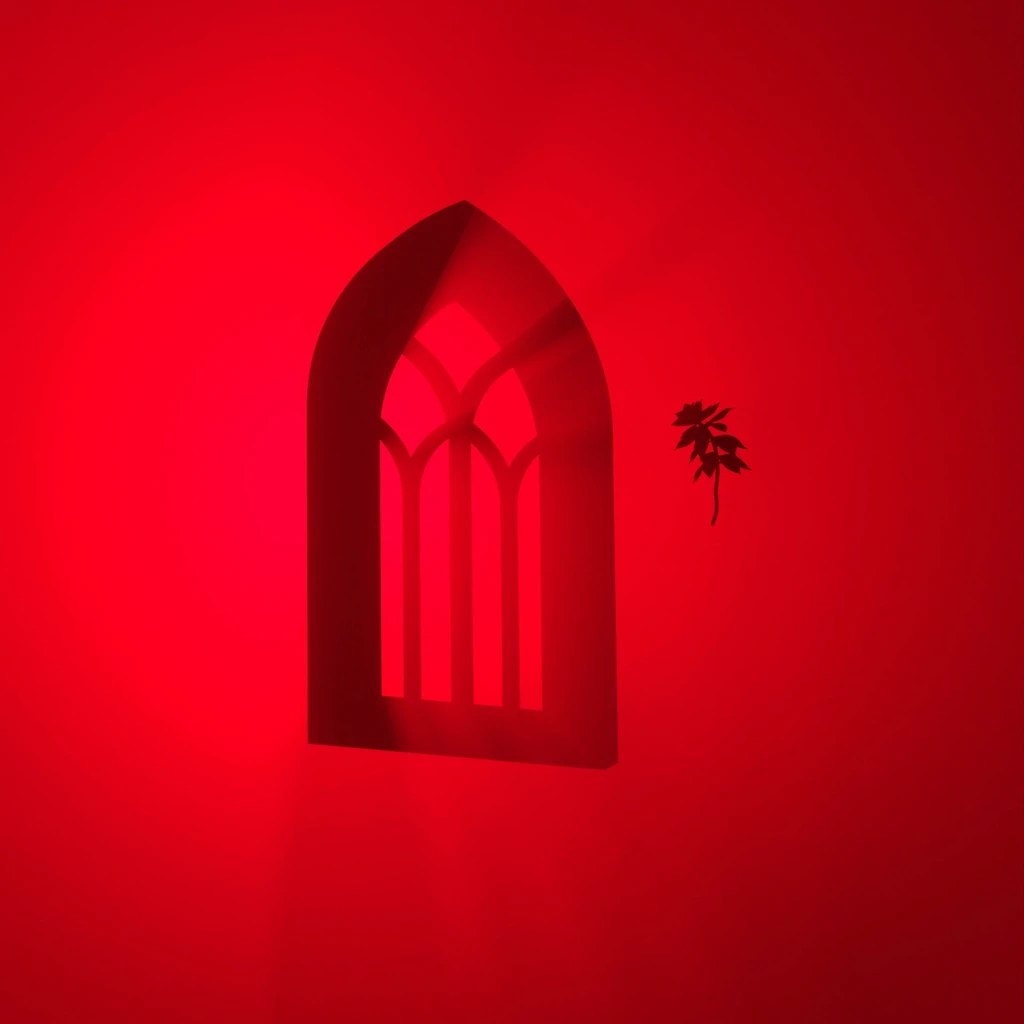 Red wall, arched window & shadow. Freelance graphic & brand identity designer Barcelona.