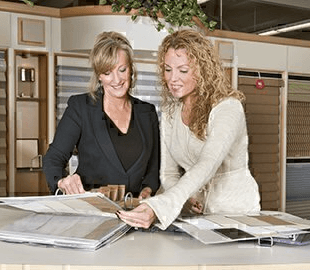 a street corner with a store front and store windows