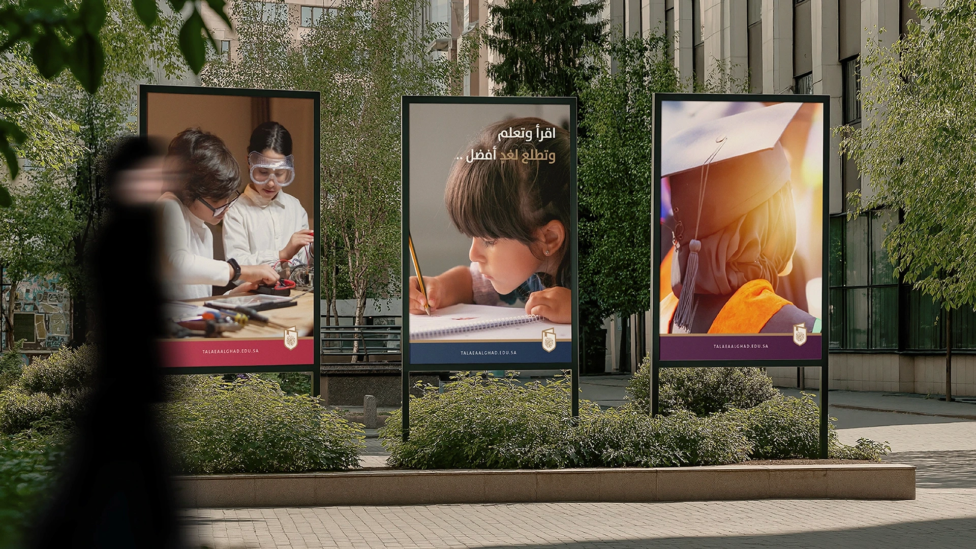 Streetside billboard with flyposters of the Batch.Works brand and illustrations