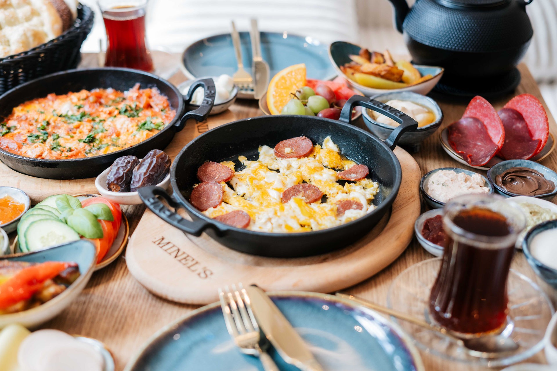 luxury restauarant interior in blue colors with large chandelier