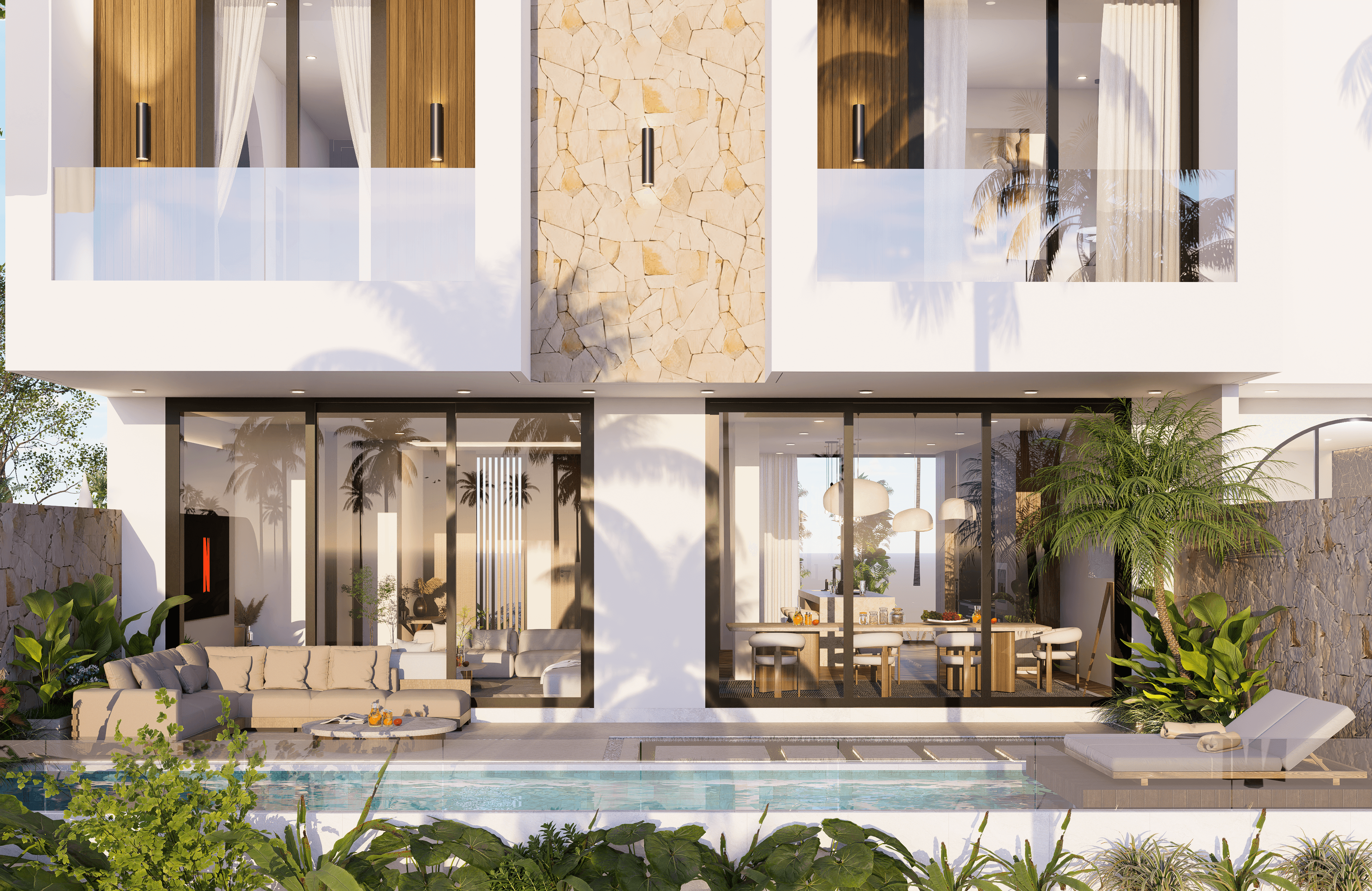 A serene outdoor seating area with two chairs, surrounded by lush greenery and a glassed-in structure.