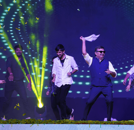 Two Men Using Laptop