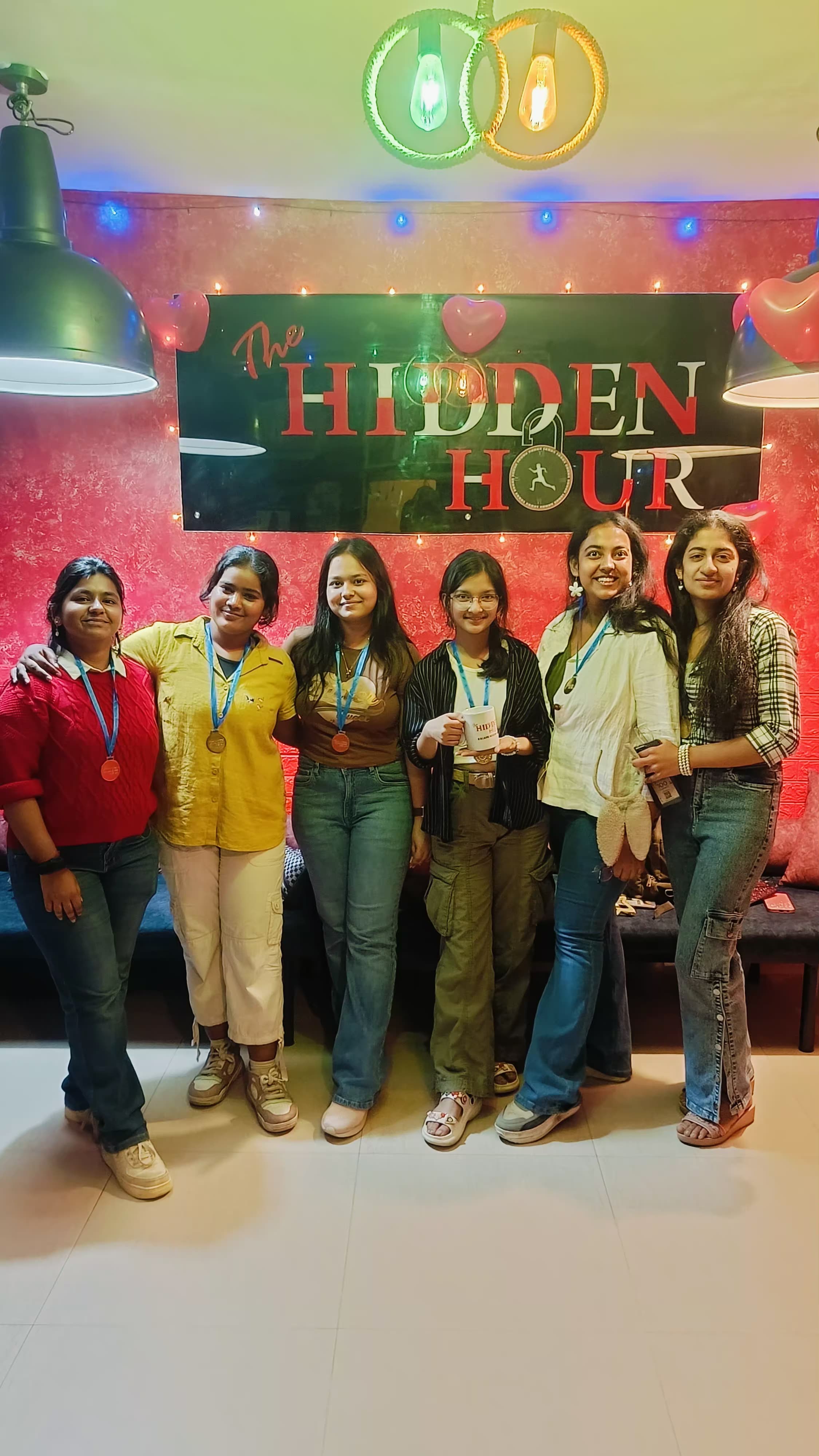 2 Decorated birthday party venue at Hidden Hour Noida with colorful balloons and cake setup