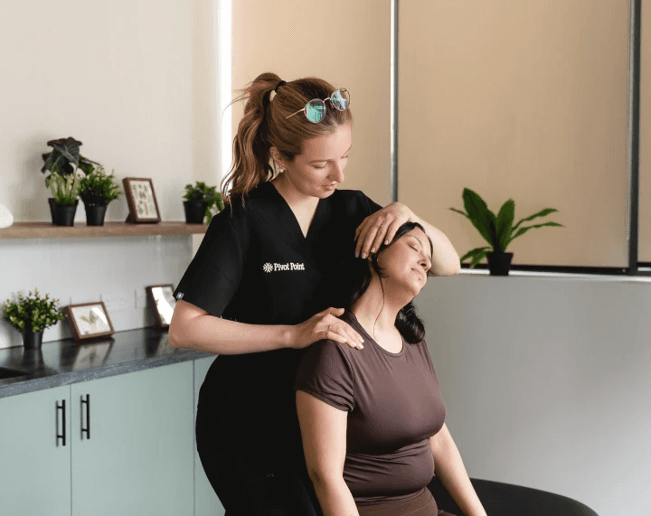 A physiotherapist providing physiotherapy services to a patient with neck complaints