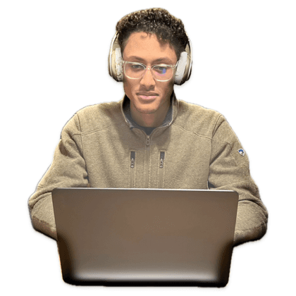 Zander typing on a laptop
