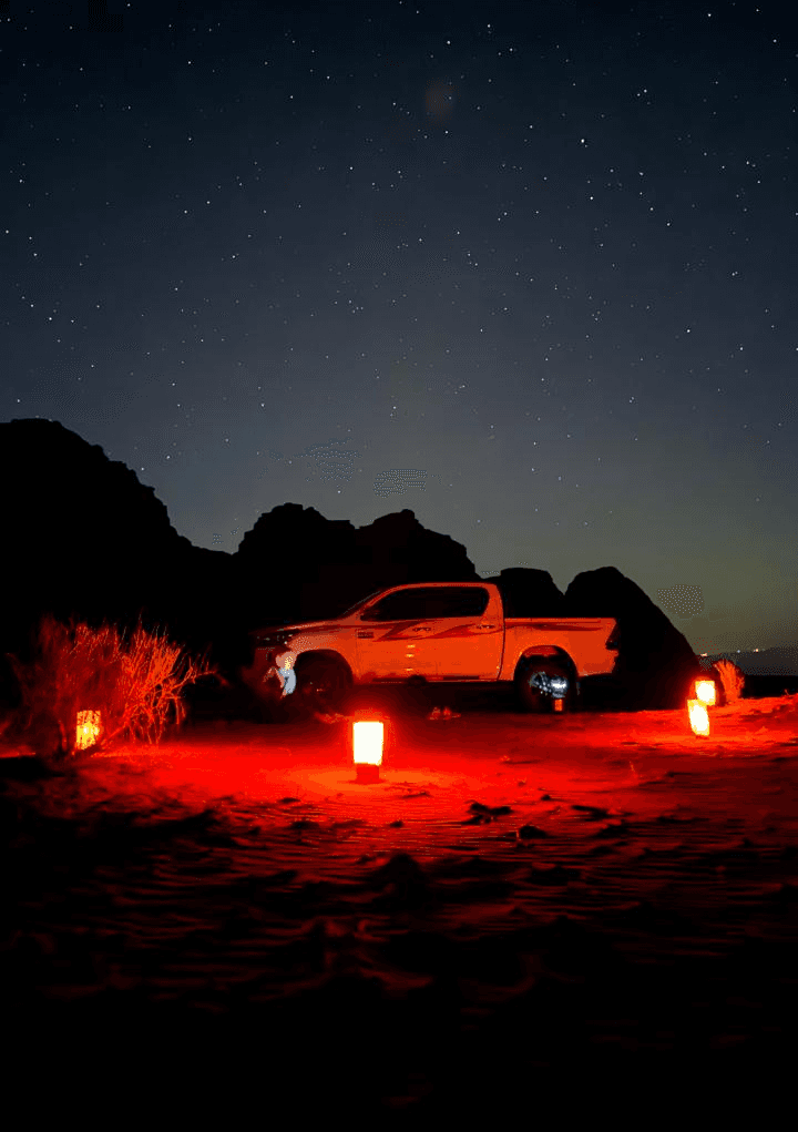 4x4 Jeep lighted by red candles on a Night Tour