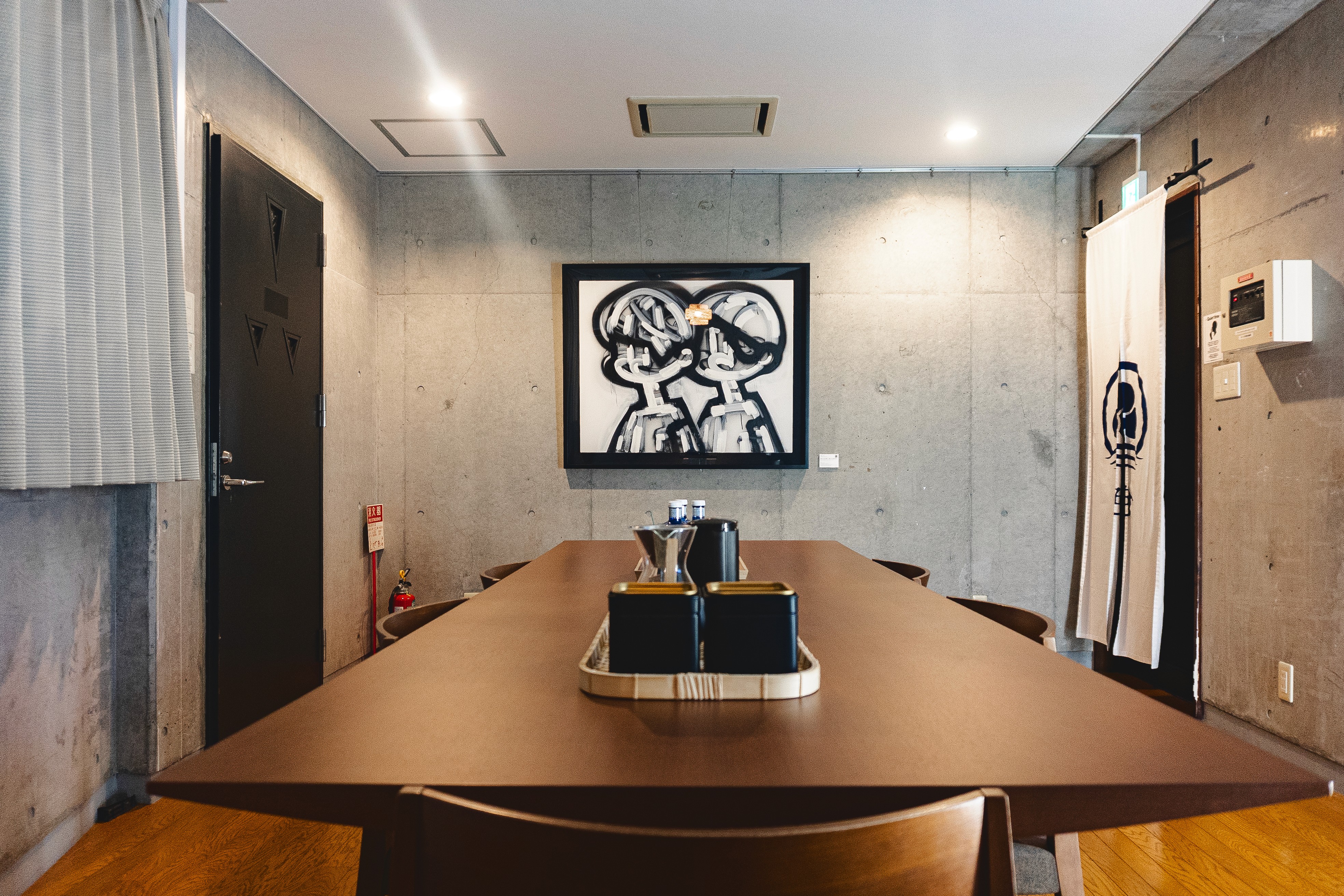 A traditional dining room with classic furniture and elegant interior details.