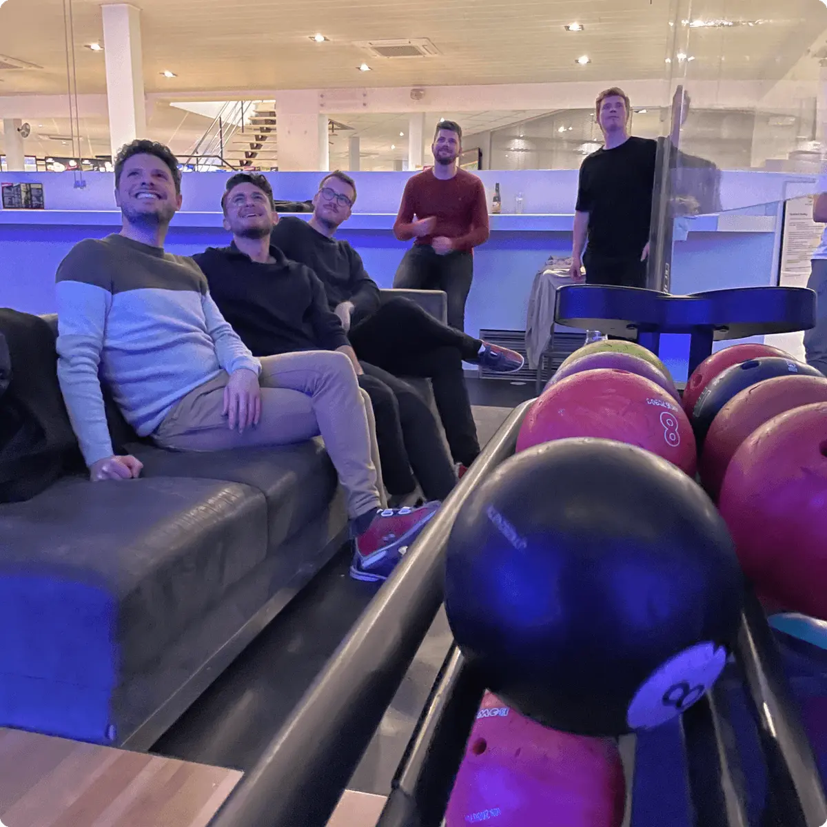 people in bowling alley