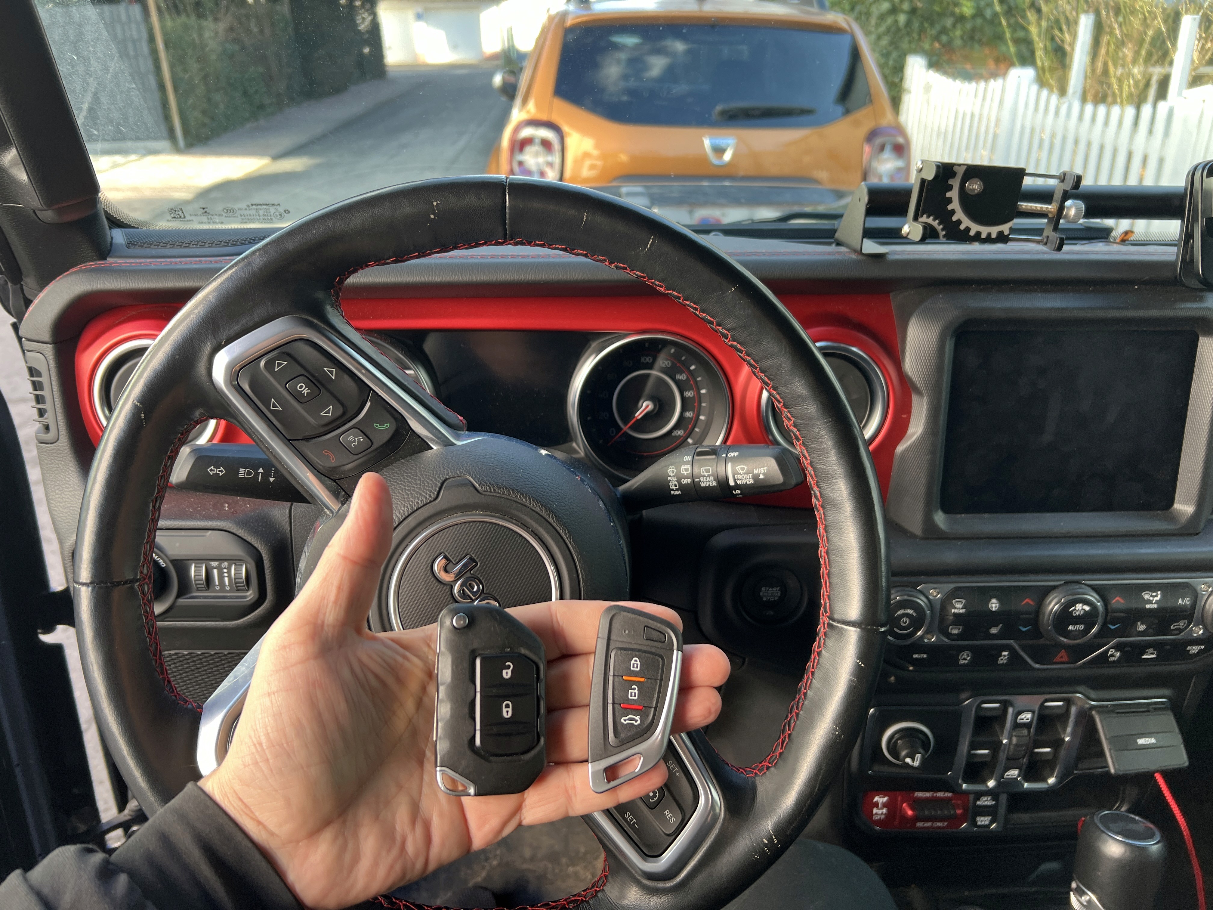 a person swimming in the water with grass
