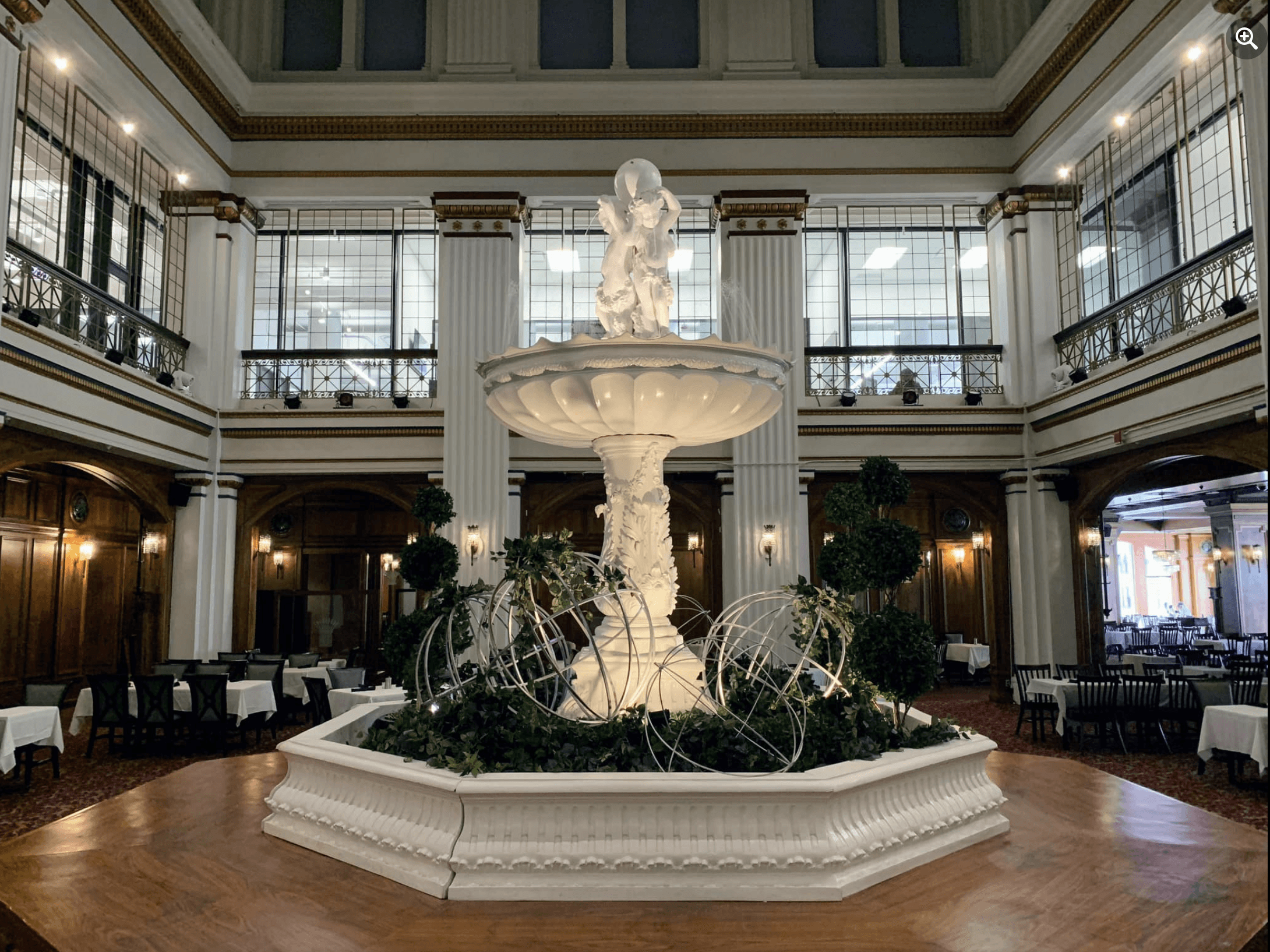 Old fountain in center of dining room