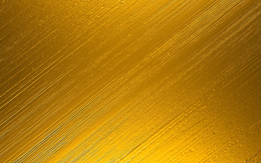 a gold metallic background with vertical lines