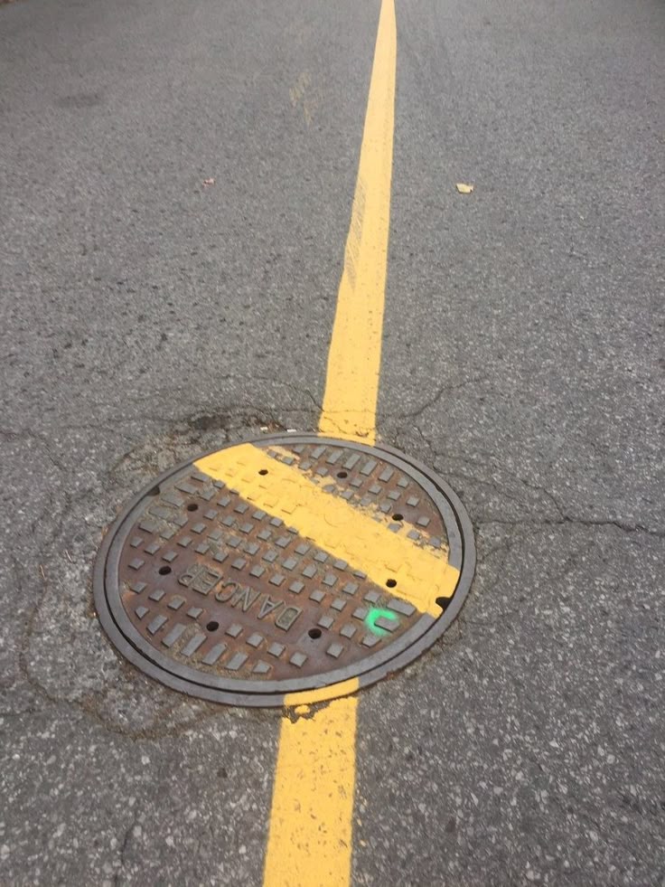 A man playing a drum in front of a group of people