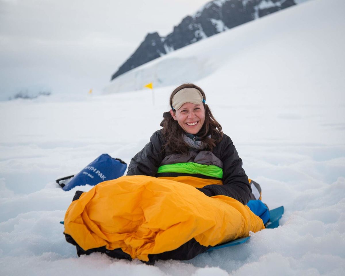 Woman camping in Antarctica on a Quark Expeditions cruise