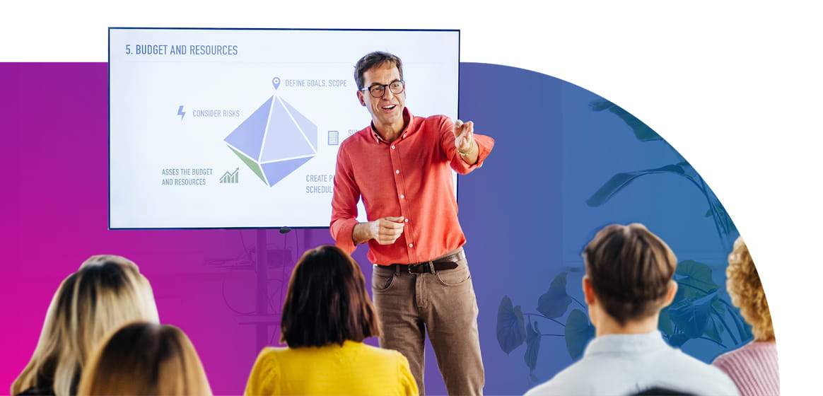 A man gives a presentation to his colleaugues