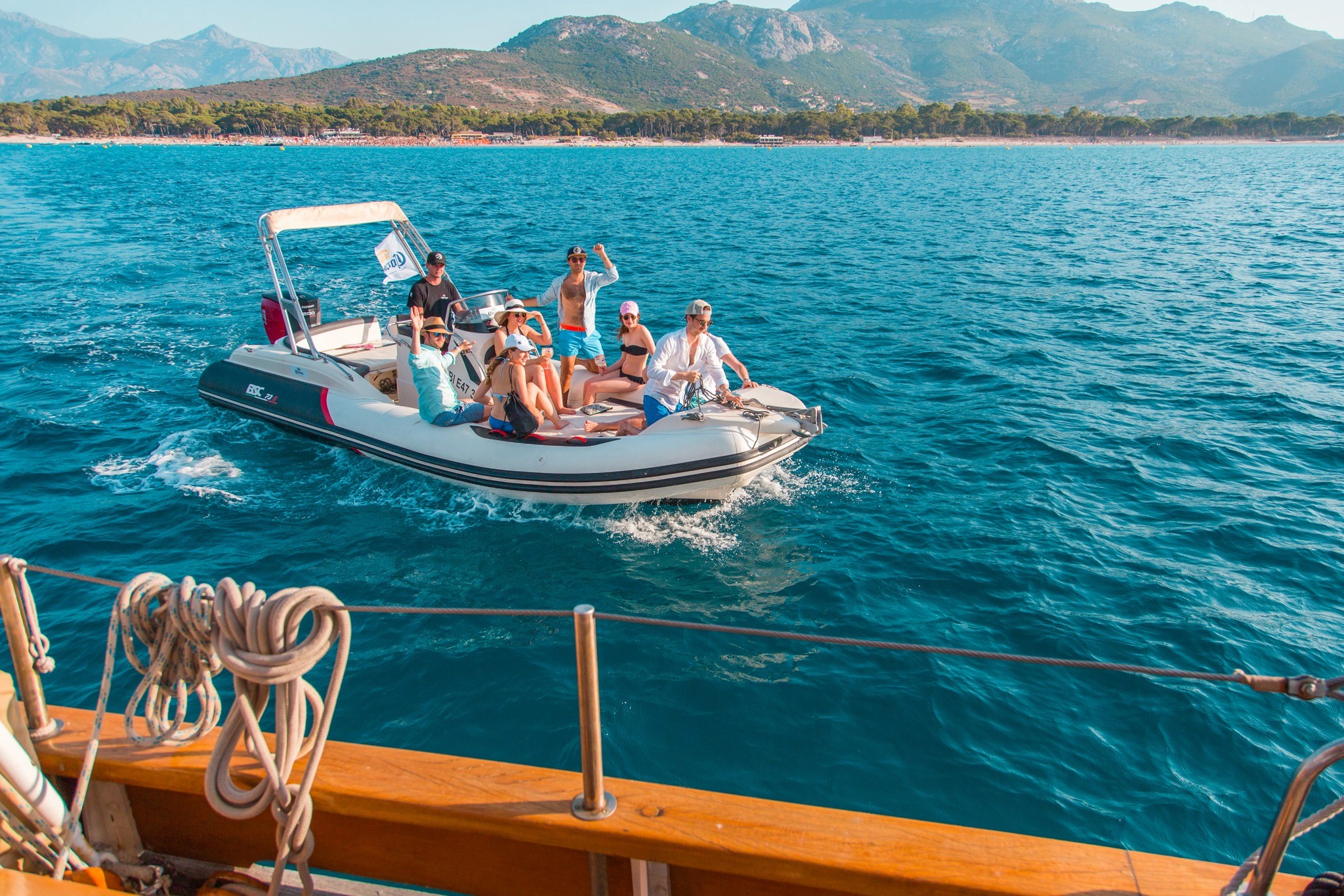red and white boat on sea during daytime